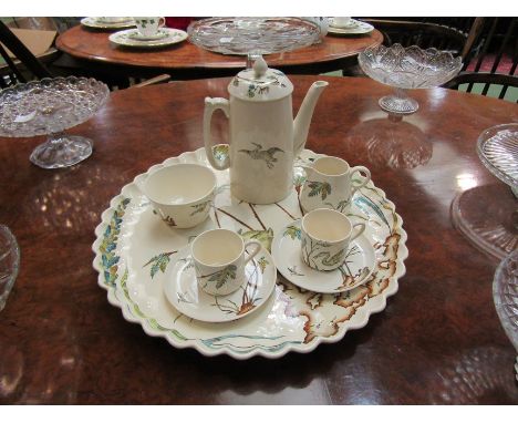 A 19th Century coffee set for two decorated in aesthetic fashion depicting a crane amongst bamboo comprising; two cups and sa