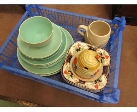 A mixed lot including Clarice Cliff mug, honey pot (a/f), Woods Burslem "Grafton" dessert dishes and Poole pottery plates etc