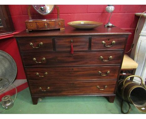 A George III flame mahogany chest of six drawers with brass swan neck handles over bracket feet (top central drawer with key)