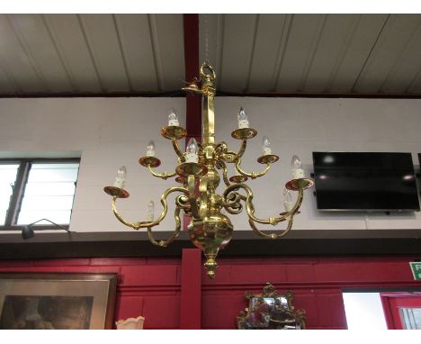 A Dutch style brass twelve branch chandelier 