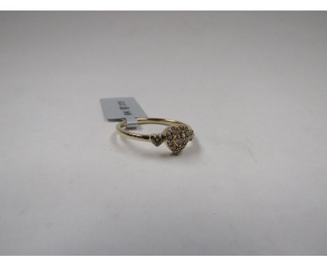 A 9ct gold diamond heart ring, size N/O, 1.8g with certificate 