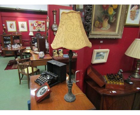 A bronzed effect table lamp with column and acanthus leaf detail silk shade, 90cm tall 