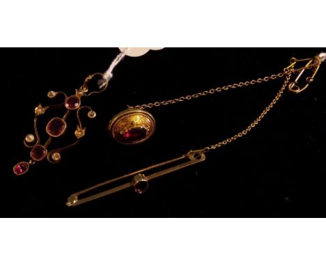 An Art Nouveau style pendant, set garnets, diamonds and seed pearls, a 9ct gold bar brooch, and a 19th century memoriam brooc