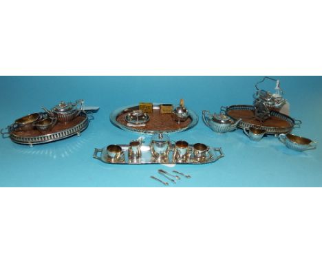 An Edwardian silver miniature doll's house tea service, comprising a kettle on a stand with burner, a teapot, a milk jug, a s