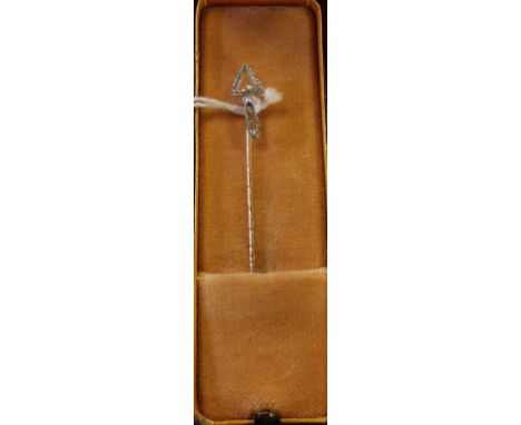 A stick pin, the terminal in the form of a trowel, set diamonds, boxed