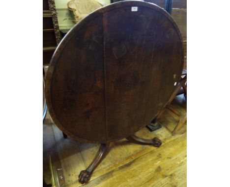 A 19th century mahogany centre table, the tilt top on a tripod base, 110 cm wide