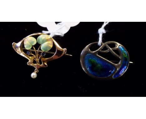 An Art Nouveau 9ct gold, enamel, sapphire and seed pearl brooch, and an Arts and Crafts silver and enamel brooch, Charles Hor