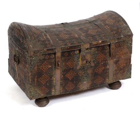 An unusual wicker travelling trunk, with brass mounts, on bun feet, probably 18th century, 80 cm wide  See illustration Condi