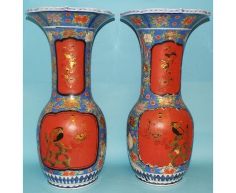 A large pair of Japanese vases, decorated birds and foliage in enamel colours, and with lacquer panels, 57.5 cm high (2)