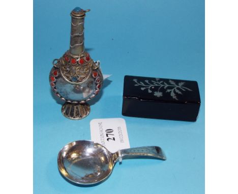 A George III silver caddy spoon, with bright cut decoration, initialled, Joseph Taylor, Birmingham 1796, a lacquered snuffbox