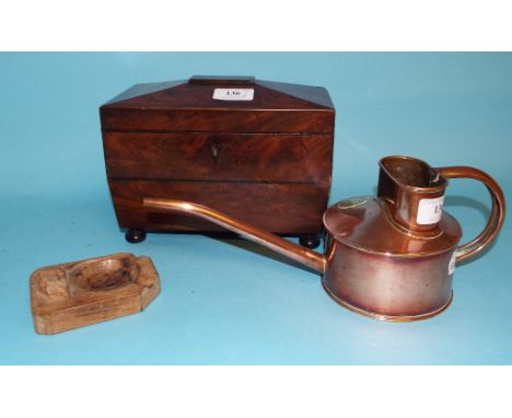 A mahogany tea caddy, of sarcophagus form, 22.5 cm wide, a Robert 'Mouseman' Thompson ashtray, and a Haws copper watering can