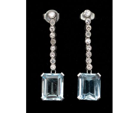 A pair of aquamarine and diamond drop earrings, in white coloured metal mounts, in a fitted James R Ogden & Sons Ltd box  See