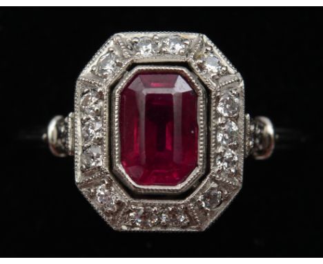 An Art Deco style ruby and diamond ring, in a white coloured metal mount  See inside front cover colour illustration Conditio