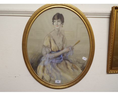 Lewis Baumer, a three quarter length portrait of Christine Gutch, oval, pastel, signed, 51.5 x 41.5 cm Condition report Repor