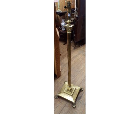 A brass Corinthian column standard lamp