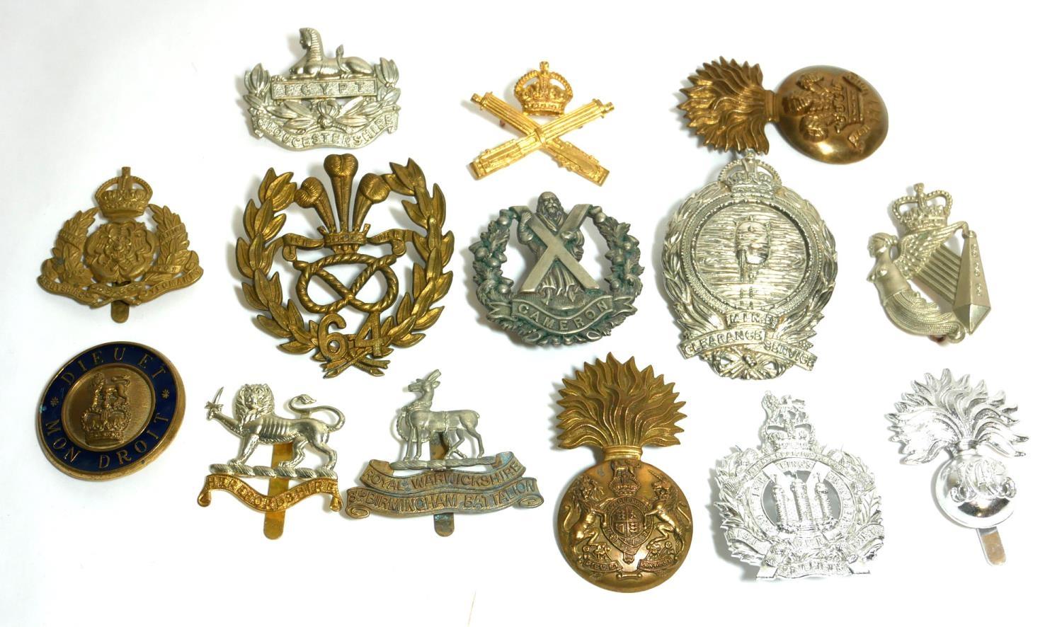 A COLLECTION OF FOURTEEN BRITISH ARMY REGIMENTAL AND CAP BADGES A ...