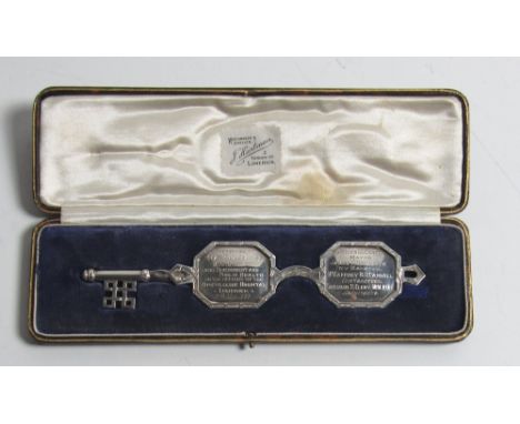 Co. Limerick Interest

[O'Ceallaigh (Sean T.)] A large elaborately engraved silver Key, approx. 7" long, in the form of a pai
