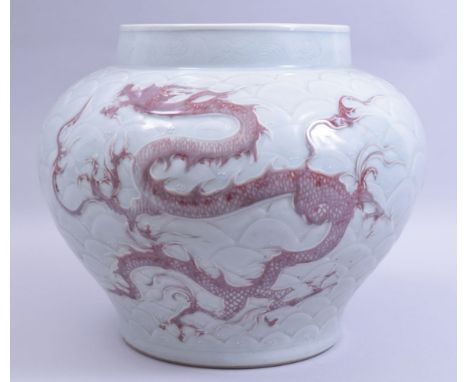 A LARGE CHINESE MING STYLE CELADON GLAZED AND COPPER RED DRAGON VASE, the body carved with scale pattern and decorated with u