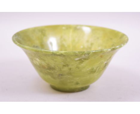 A SMALL CHINESE JADE BOWL, 12.5cm diameter.