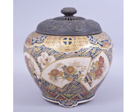 A JAPANESE MEIJI IMPERIAL SATSUMA KORO AND COVER, with panels decorated in enamel depicting flora, with a metal embossed cove