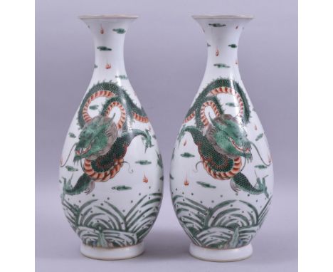 A PAIR OF CHINESE FAMILLE VERTE PORCELAIN VASES, the body of each painted with a dragon and the flaming pearl of wisdom with 