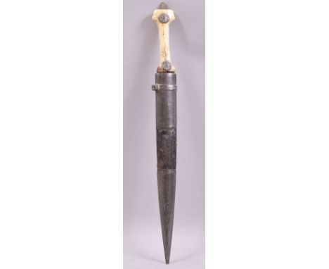 A 19TH CENTURY OTTOMAN KINDJAL WITH WALRUS IVORY GRIP, the 30cm tapering blade etched and dated 1896, the characteristic walr