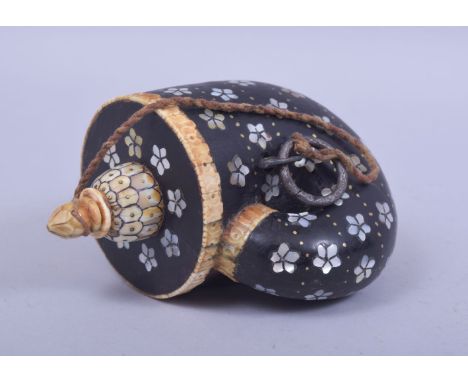 A LATE 18TH CENTURY INDIAN INLAID HARDWOOD POWDER FLASK, inlaid with mother of pearl / abalone petal decoration between brass