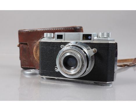 A Konica I 35mm Rangefinder Camera, made in Occupied Japan, circa 1949, serial no 938312, body F, some brassing, signs of cor