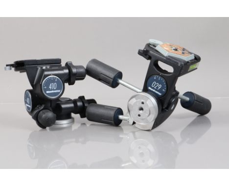 Two Manfrotto Tripod Heads, A Manfrotto 029, a 410, both move freely, both with quick release plates, G 
