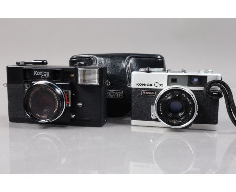 Two Konica C35 Compact Cameras, a Konica C35 Rangefinder, shutter working, rangefinder functions, flash working, body G-VG, e