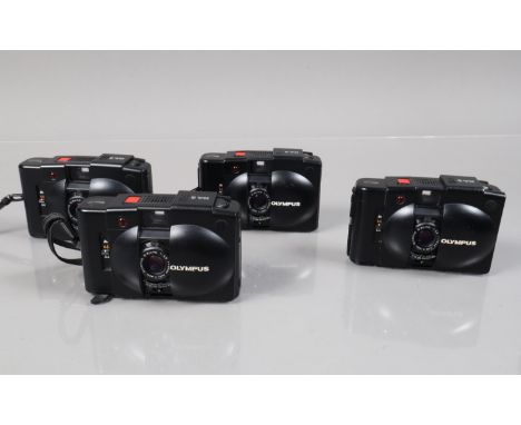 Four Olympus XA 2 Compact cameras, shutters working, three with working self timers, bodies G, elements G 