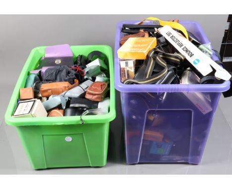 Two Boxes of Camera Related Accessories, including filters, flash units, hoods, caps and other items 