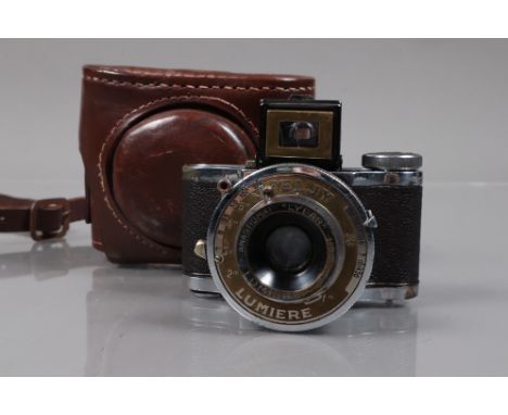 A Lumiere Super Eljy Sub Miniature Camera, type 3, shutter working, body G, some brassing to front, elements G, in ERC 