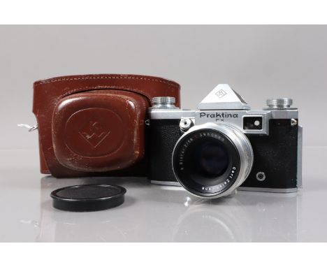 A KW Praktica FX SLR Camera, shutter sluggish on slow speeds, self timer working, body G, light wear, with Carl Zeiss Jena T 