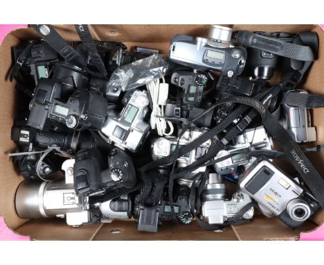 A Tray of Digital Cameras, manufacturers include, Konica, Konica Minolta, Olympus, Panasonic and other examples, all untested