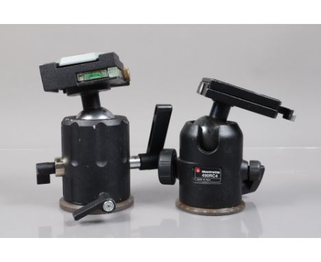 Two Manfrotto Tripod Heads, a Manfrotto 268, a 490RC4, both move freely, both with quick release plates, both G 