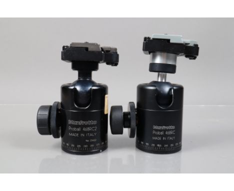 Two Manfrotto Tripod Heads, two Proball 468RC heads, both with quick release plates, both move freely, one G, other G-VG 