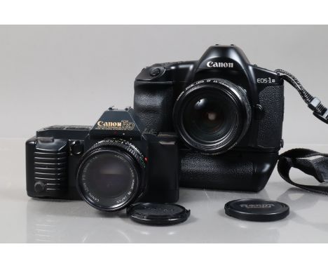 Two Canon  Electronic SLR Cameras, comprising an EOS-1N HS with Power Drive Booster E1, body VG, not working with BC code, wi