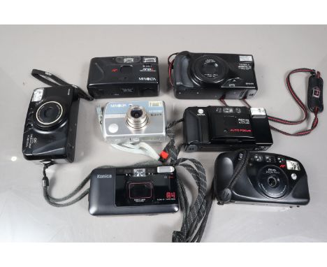 A Small Tray of Minolta and Other Compact Cameras, comprising a Minolta AF-E, an AF101R, a Riva Zoom Pico, a Dimage E323, a D