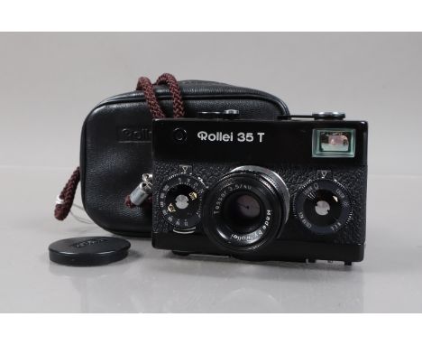 A Black Rollei 35T Compact Camera, serial no 6361801, made by Rollei Singapore, body G, small ding to front of top plate shut