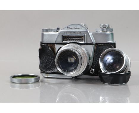 A Voigtländer Bessamatic SLR Camera, serial no 28073, body P-F, leatherette peeling at front, Synchro-Compur shutter sticking