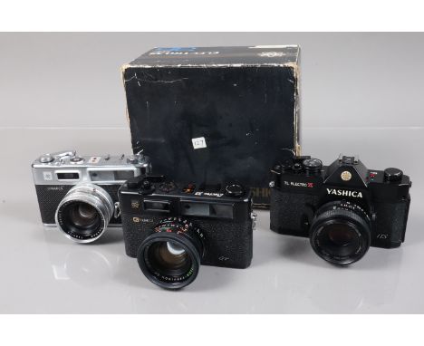 Three Yashica Electro Cameras, a TL Electro X ITS, shutter working, self timer working, body G, light wear, elements G, an El
