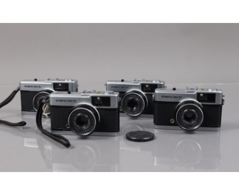 Four Olympus Trip 35 Compact Cameras, all shutters working, three with unresponsive light cells, one appears to function as s