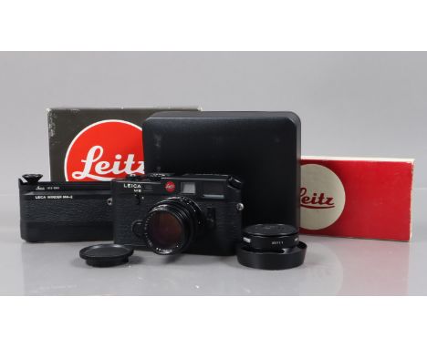 A Black Leitz Wetzlar Leica M6 Rangefinder Camera, serial no 1679111, 1985, body G-VG, shutter slow speed escapement not work