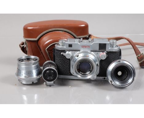 A Robot Royal Model III Rangefinder Camera and Lenses, serial no G-120978, body F-G, shutter, spring motor and rangefinder wo