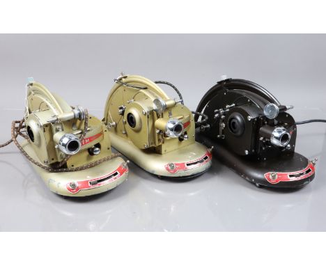 Three Pathescope Gem Cine Projectors, comprising of two gold coloured 9.5mm examples and a black 16mm example in a 9.5mm box,