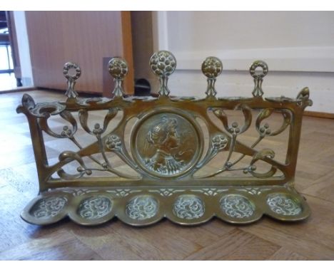 A quantity of Copper and Brassware, including art nouveau brass pipe rack, jam pan, horse brasses, fire curb, etc (a lot)