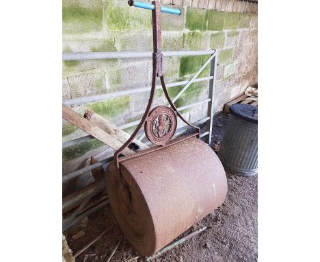 A vintage cast iron Roller, by H. R. Williams &amp; Co. Barnstaple, 60in (152cm) high x 24in (61cm) diameter. Note; This lot 