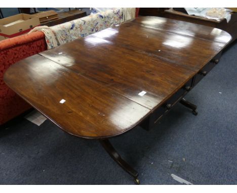 A 19th century mahogany Sofa Table, the rectangular twin-flap top with moulded edge and rounded angles, above opposing drawer