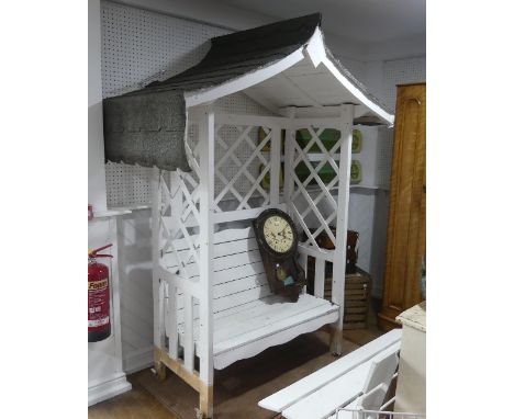 A vintage white painted wooden garden Arbour, 90in (228.5cm) high x 66in (167.5cm) wide x 40in (101.5cm) deep.